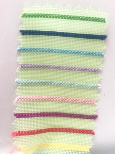 Rainbow Mesh Fabric (on Green)